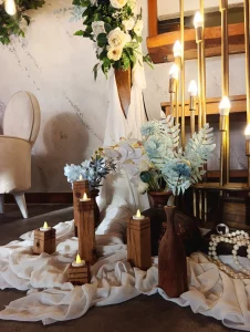 Engagement table with candles and pastel flowers