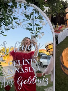 Mirror welcome sign with script lettering at a henna night in Kusadasi
