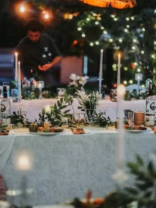 Wedding table decoration with greenery and candles in Kusadasi