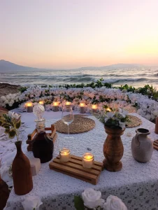 Small candle and petal proposal setup on the beach