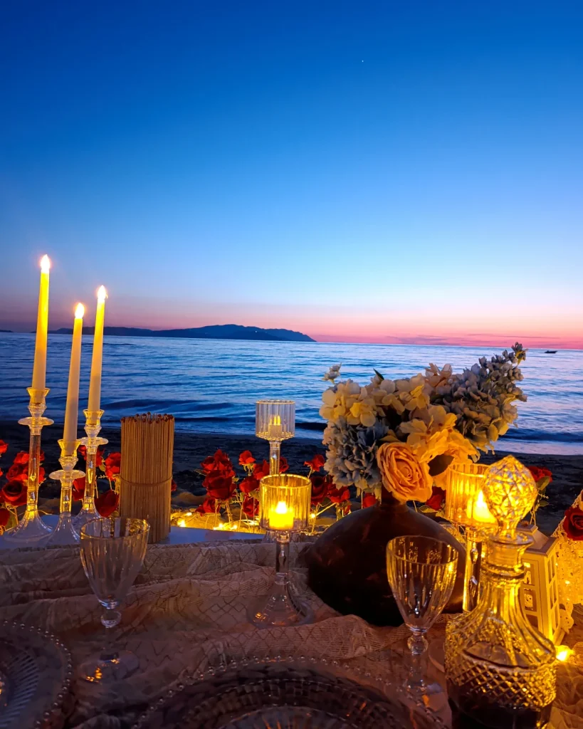 Candlelit private dinner proposal table by the sea in Kusadasi